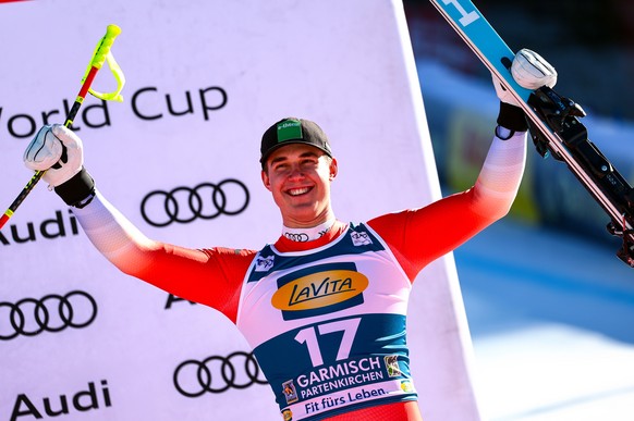 epa11110470 Third placed Franjo von Allmen of Switzerland celebrates on the podium of the Men&#039;s Super-G race at the FIS Alpine Skiing World Cup in Garmisch Partenkirchen, Germany, 28 January 2024 ...