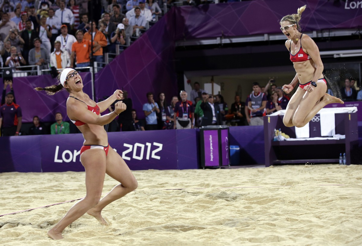 FILE - In this Aug. 8, 2012, file photo, Miss May Treanor, left, and Kerri Walsh Jennings celebrate a win over April Ross and Jennifer Kessy during the women's Gold Medal beach volleyball match a ...