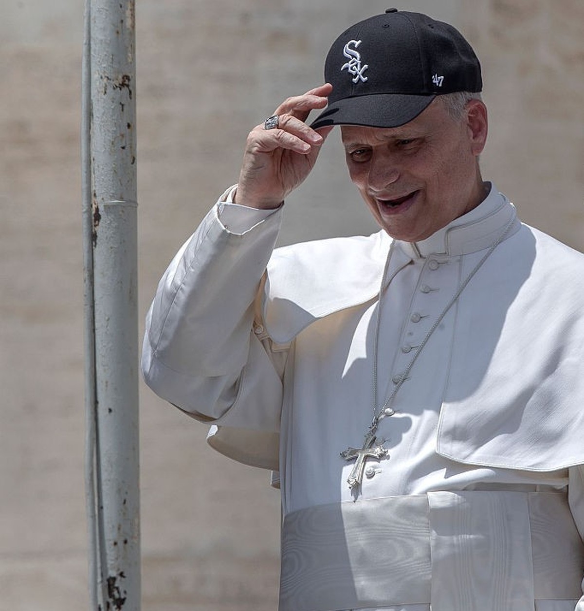 VATICAN CITY, VATICAN - 2025/06/11: Pope Leo XIV wears a Chicago White Sox baseball team cap given to him by a newly wedded couple during his weekly general audience in St. Peter's square. (Photo ...