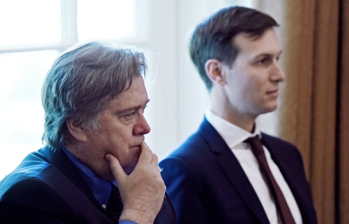 epa06150305 (FILE) - Jared Kushner (R) and Steve Bannon (L), two of President Trump's top advisers, listen during during a Cabinet meeting in the Cabinet Room of the White House, in Washington, D ...