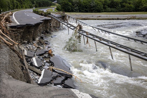 The highway A13 between Lostallo and Soazza destroyed by the force of the Moesa river, caused by heavy rain in the Misox valley, in Lostallo, southern Switzerland, on Sunday June 23, 2024. Massive thu ...