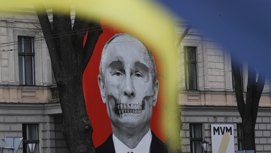 epa10426146 The anti-Putin banner is seen in front of the Russian Embassy building in Riga, Latvija, 24 January 2023. atvia&#039;s Ministry of Foreign Affairs released a statement on 23 January announ ...
