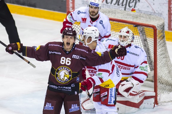 L?attaquant genevois Joel Vermin, gauche, laisse eclater sa joie, lors du match du championnat suisse de hockey sur glace de National League LNA, entre le Geneve Servette HC et le SC Rapperswil-Jona L ...