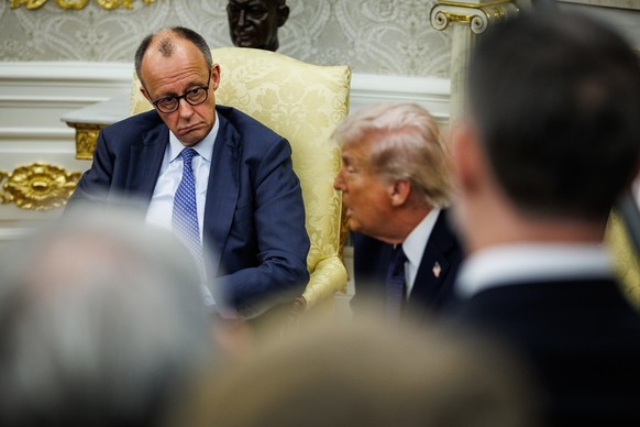 epa12792516 US President Donald Trump (R) and German Chancellor Friedrich Merz hold a bilateral meeting in the Oval Office at the White House in Washington, DC, USA, 03 March 2026. EPA/SAMUEL CORUM /  ...