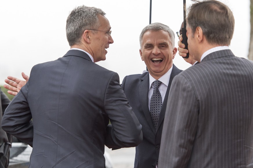 Federal Councillor Didier Burkhalter, center, welcomes NATO Secretary General Jens Stoltenberg, left, to official meetings in Bern, Switzerland, Thursday, March 2, 2017. (Lukas Lehmann/Keystone via AP ...