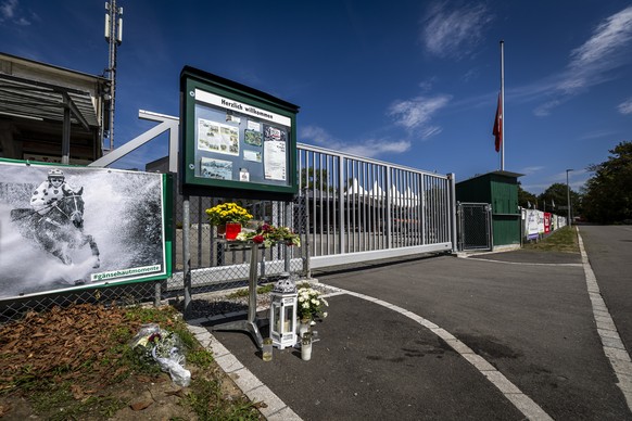 epa13206767 Flowers and candles are laid in front of the entrance to the Schachen horse racing track, following a deadly shooting at a rave party in Aarau, Switzerland, 02 September 2026. A shooting o ...