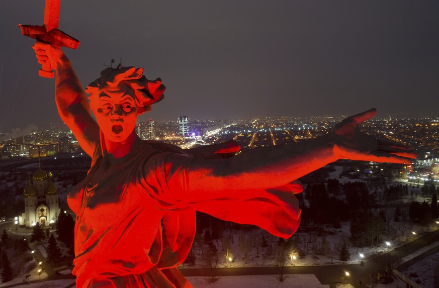 A giant statue of Mother of the Homeland is seen atop of the memorial on Mamayev Hill in the southern city of Volgograd, Russia, on Wednesday, Feb. 1, 2023, the 80th anniversary of the Soviet victory  ...