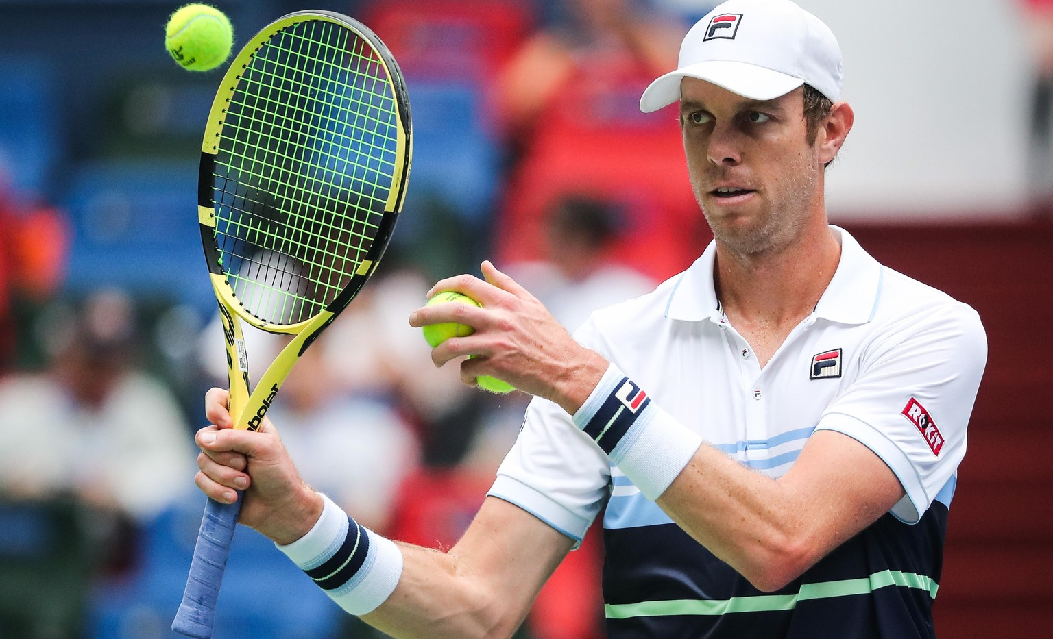 American professional tennis player Sam Querrey competes against Italian professional tennis player Fabio Fognini during the first round of 2019 Rolex Shanghai Masters, in Shanghai, China, 7 October 2 ...