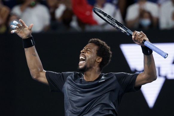 Gael Monfils of France reacts during his quarterfinal match against Matteo Berrettini of Italy at the Australian Open tennis championships in Melbourne, Australia, Tuesday, Jan. 25, 2022. (AP Photo/Ha ...