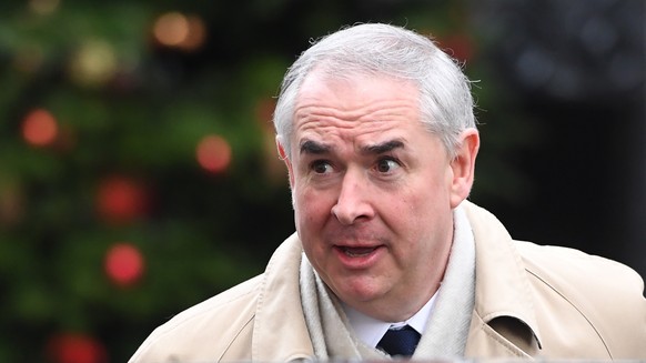 epa07207905 Britain&#039;s Attorney General Geoffrey Cox leaves a cabinet meeting in No10 Downing Street in London, Britain, 04 December 2018. Britain should be able to unilaterally cancel its withdra ...