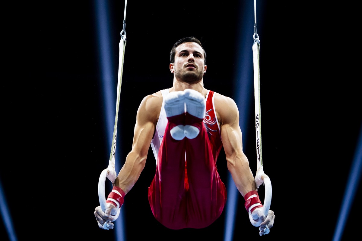 Switzerland's Pablo Braegger performs on the rings during the men's all-around final of the 2021 European Championships in Artistic Gymnastics in the St. Jakobshalle in Basel, Switzerland, o ...