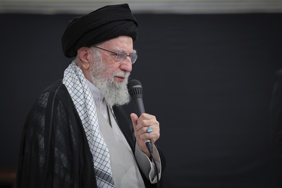 In this photo released by an official website of the office of the Iranian supreme leader, Supreme Leader Ayatollah Ali Khamenei speaks during a ceremony commemorating military personnel, nuclear scie ...