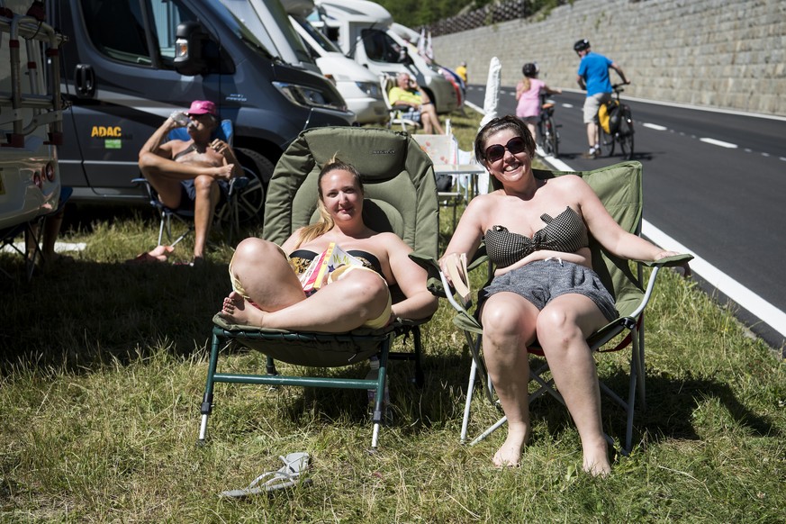 Spectators from Great-Britain pose on the race road one day before the 17th stage of the 103rd edition of the Tour de France cycling race over 184,5km between Bern and Finhaut-Emosson in Switzerland,  ...