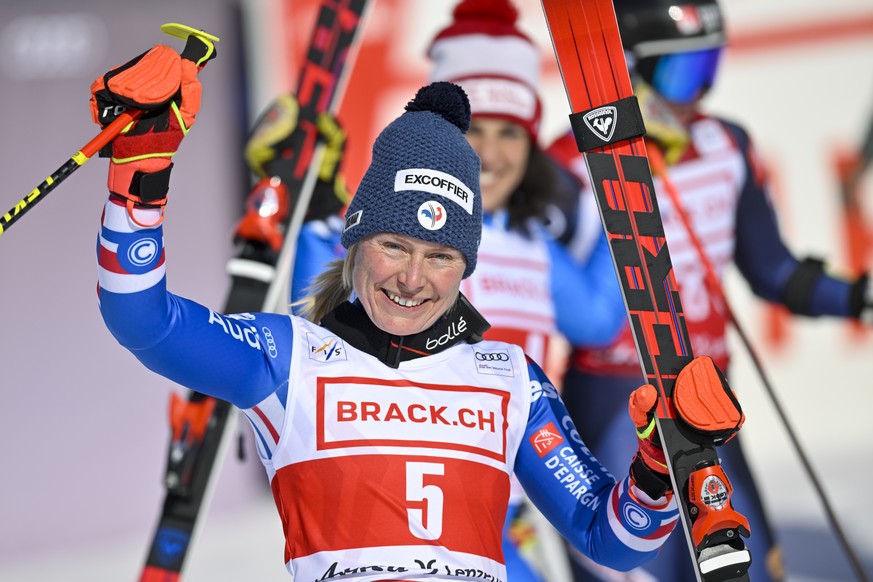 Tessa Worley of France reacts in the finish area, during the second run of the women&#039;s giant slalom race at the FIS Alpine Ski World Cup in Lenzerheide, Switzerland, Sunday, March 6, 2022. (KEYST ...