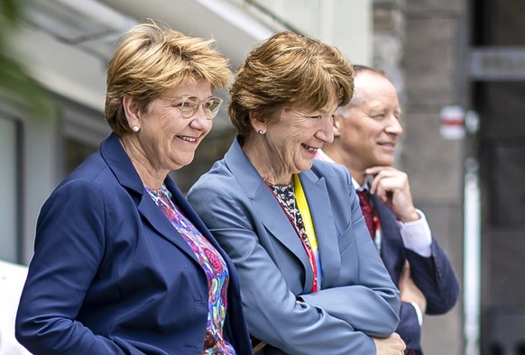 epa11415545 Swiss Federal President Viola Amherd (L) takes a break next to her Personal Counsellor Brigitte Hauser-Sueess (C) during the Summit on Peace in Ukraine in Stansstad near Lucerne, Switzerla ...