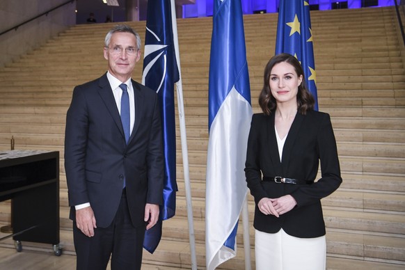 epa09545735 The Prime Minister of Finland Sanna Marin (R) meets NATO Secretary General Jens Stoltenberg (L), in Finlandia Hall in Helsinki, Finland, 25 October 2021. EPA/KIMMO BRANDT