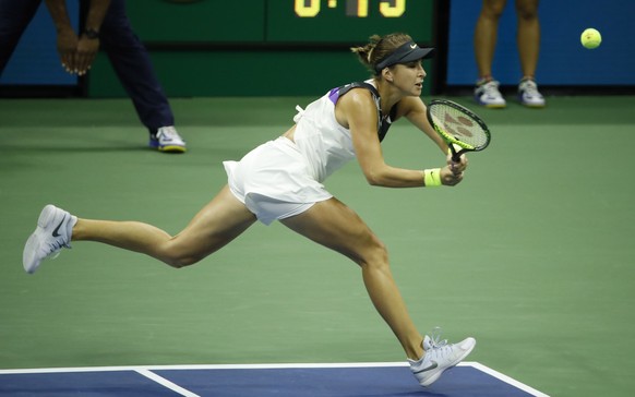 epa07821404 Belinda Bencic of Switzerland hits a return to Bianca Andreescu of Canada during their Semi-Finals round match on the eleventh day of the US Open Tennis Championships the USTA National Ten ...