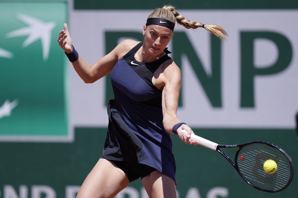 Czech Republic&#039;s Petra Kvitova returns the ball to Belgium&#039;s Greet Minnen during their first round match of the French Open tennis tournament at the Roland Garros stadium Sunday, May 30, 202 ...