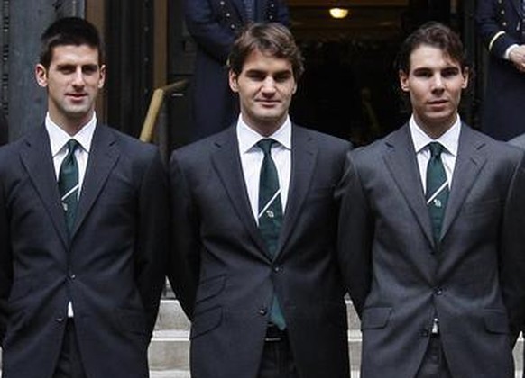 Tennis players, from left, Fernando Verdasco, Juan Martin del Potro, Novak Djokovic, Roger Federer, Rafael Nadal, Andy Murray, Nikolay Davydenko and Robin Soderling pose for a photograph in front of a ...