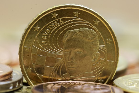 New Croatian euro coin depicting scientist Nikola Tesla is showcased at the Croatian central bank in Zagreb, Croatia, Wednesday, Dec. 14, 2022. Croatia, known for its stunning Adriatic Sea coastline a ...