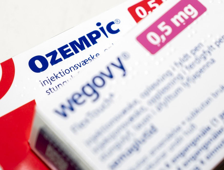 epa10538865 Packages of prescribtion drugs Ozempic and Wegovy by Novo Nordisk sit on a table in Copenhagen, Denmark, 23 March 2023. US celebrities have credited their weight loss to the FDA-approved m ...