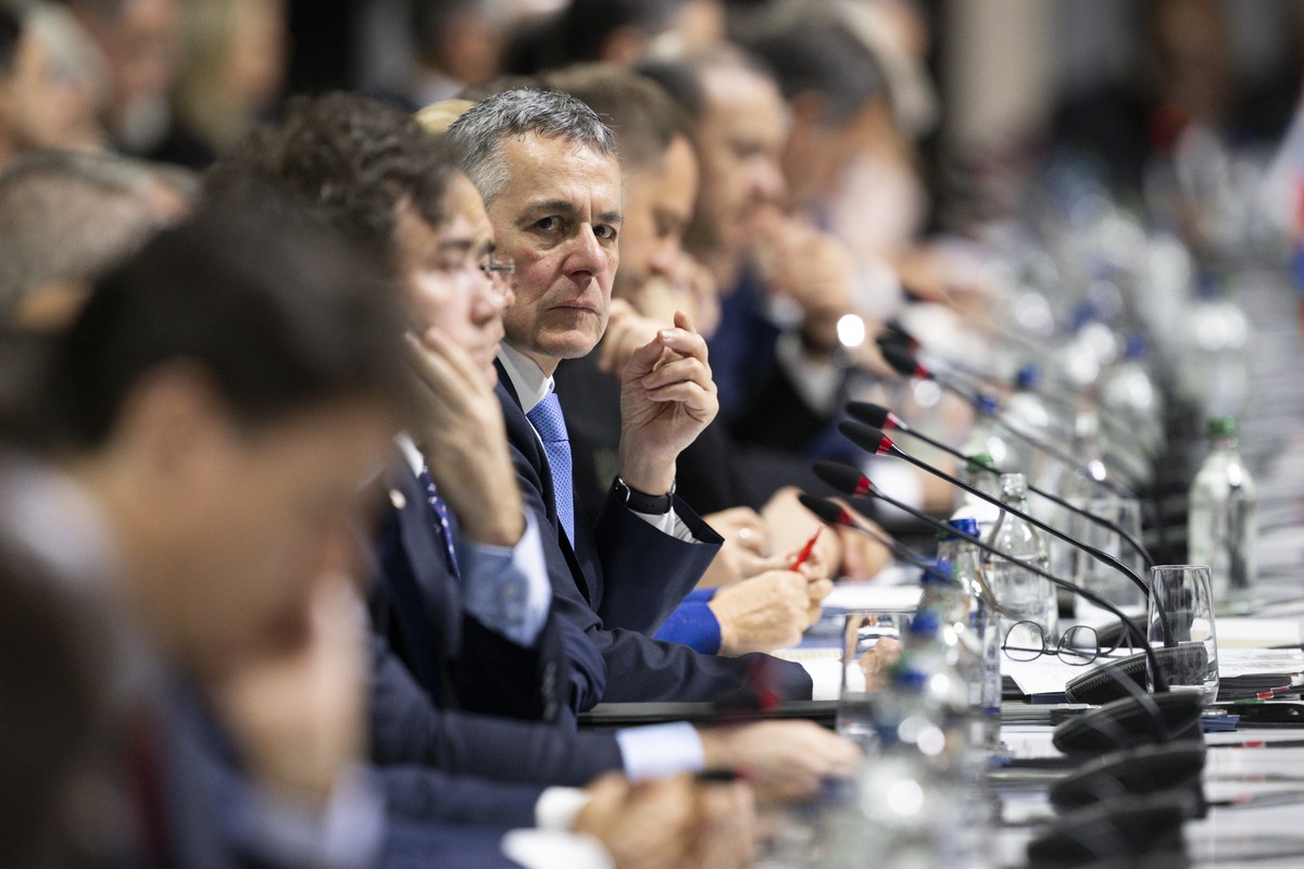 epa11413443 Swiss Federal Councillor Ignazio Cassis (C) attends the opening plenary session of the Summit on Peace in Ukraine, in Stansstad near Lucerne, Switzerland, 15 June 2024. International heads ...