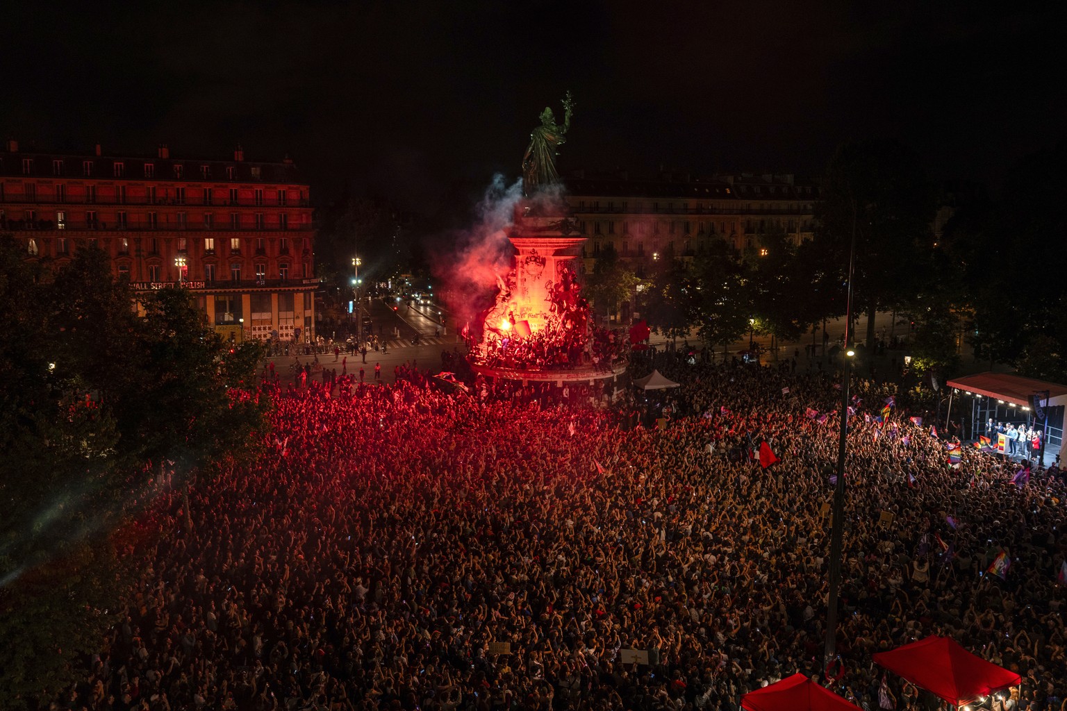People gather at Republique plaza to protest the far-right National Rally, which came out strongly ahead in first-round legislative elections, Sunday, June 30, 2024, in Paris. France&#039;s high-stake ...