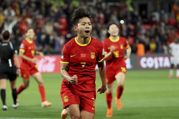 China&#039;s Wang Shuang, center, celebrates after scoring the opening goal from the penalty spot during the Women&#039;s World Cup Group D soccer match between China and Haiti in Adelaide, Australia, ...