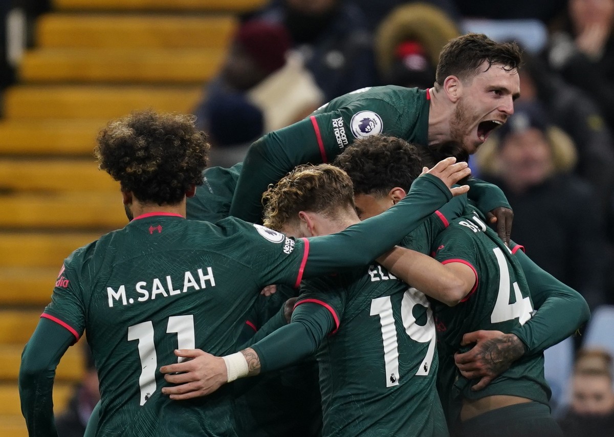 epa10378785 Liverpool's Stefan Bajcetic celebrates with teammates after scoring the 1-3 during the English Premier League soccer match between Aston Villa and Liverpool in Birmingham, Britain, 26 ...