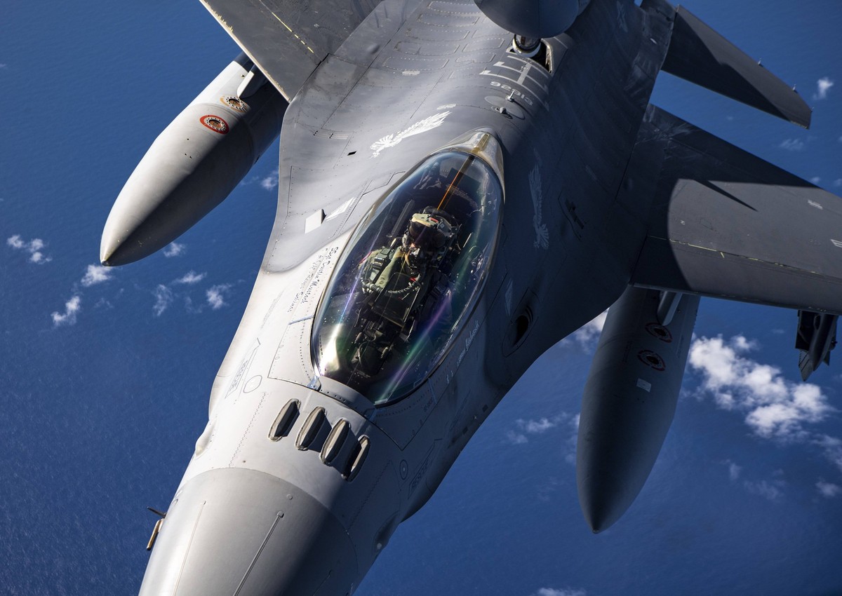 News Bilder des Tages STYLELOCATIONA U.S. Air Force F-16 Fighting Falcon fighter jet, assigned to the 13th Fighter Squadron, during exercise Cope North 21 February 18, 2021 near Guam. Cope North is an ...