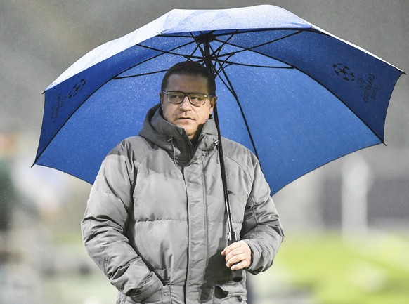 File - Moenchengladbach's sporting director Max Eberl is pictured in the rain ahead of the Champions League, Group B, soccer match between Borussia Moenchengladbach and Inter Milan at the Borussi ...