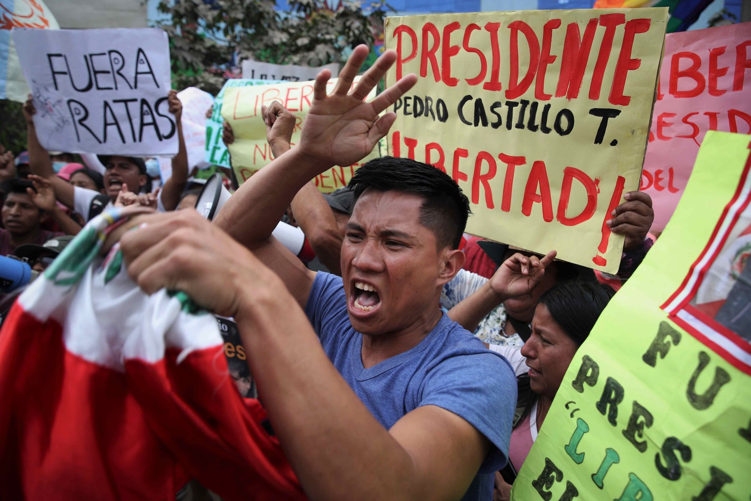 epa10364608 Hundreds of people demand the release of former President Pedro Castillo, outside the Police station where he is being held in Lima, Peru, 13 December 2022. The Permanent Criminal Chamber  ...