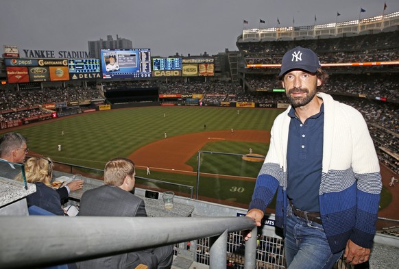 Juventus midfielder Andrea Pirlos stands in the seating area at Yankee Stadium as the Detroit Tigers and the New York Yankees played a baseball game Saturday, June 20, 2015, in New York. (New York Yan ...