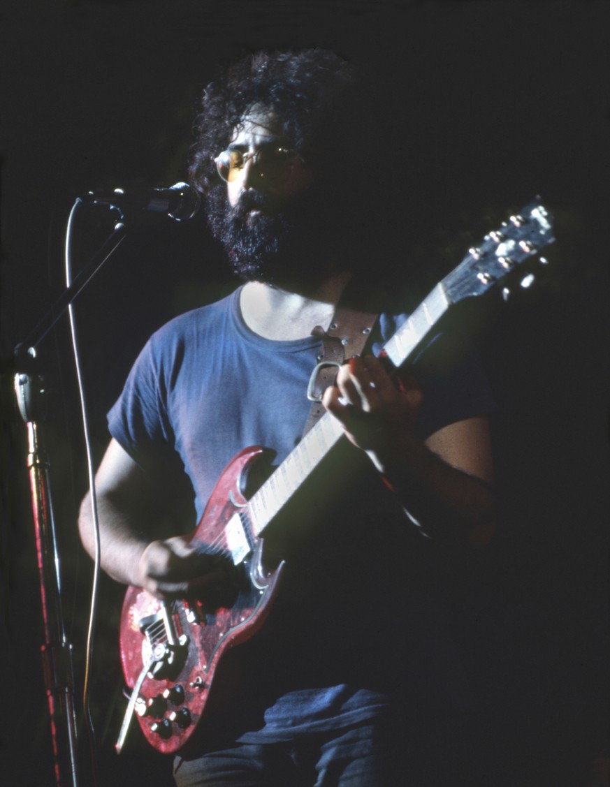Und nun, in nicht-chronologischer Reihenfolge, einige der Performer: Hier etwa Jerry Garcia von The Grateful Dead. 