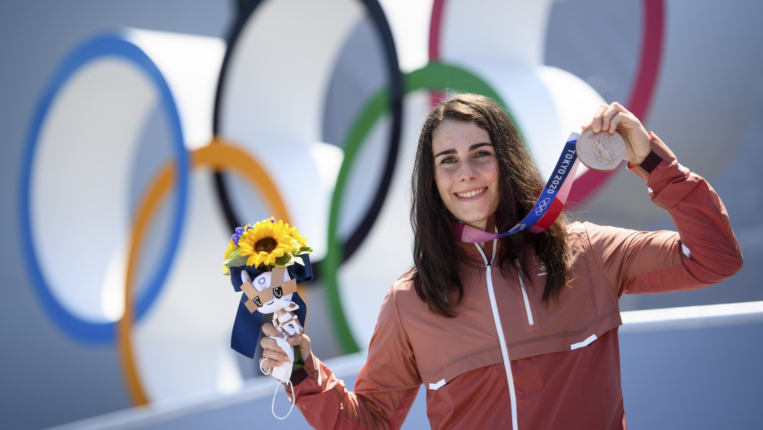 Bronze medal winner Nikita Ducarroz of Switzerland celebrates with her medal during the victory ceremony after the women&#039;s BMX Freestyle finals at the 2020 Tokyo Summer Olympics in Tokyo, Japan,  ...