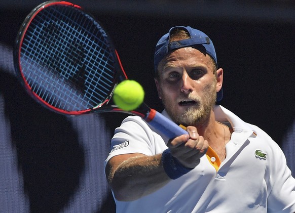 United States&#039; Denis Kudla makes a forehand return to Austria&#039;s Dominic Thiem during their second round match at the Australian Open tennis championships in Melbourne, Australia, Thursday, J ...