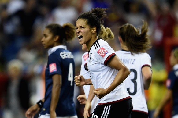 MONTREAL, QC - JUNE 26: Celia Sasic of Germany celebrates as she scores their first goal from a penalty during the FIFA Women&#039;s World Cup Canada 2015 Quarter Final match between Germany and Franc ...