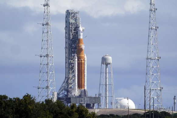 The NASA moon rocket for the Artemis mission stands on Pad 39B at the Kennedy Space Center Wednesday, Sept. 21, 2022. A hydrogen leak was detected on the rocket during a tanking test this morning. (AP ...