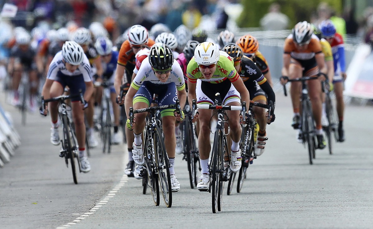 Netherlands' Marianne Vos, center right, sprints to the finish line to win stage three of the Women's Tour of Britain, Clacton, England, Friday, May 9, 2014. (AP Photo/PA, Gareth Fuller) UNI ...