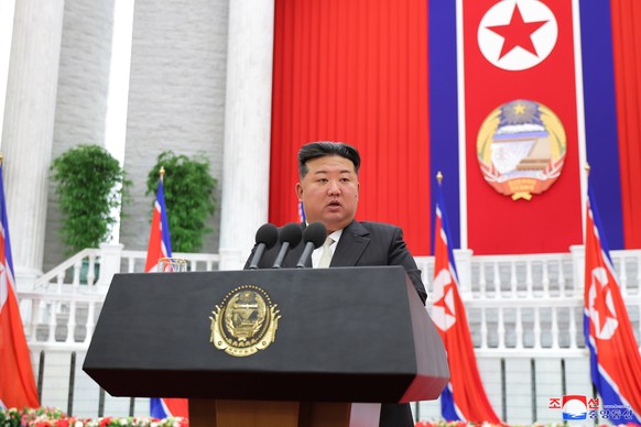 epa11595456 A photo released by the official North Korean Central News Agency (KCNA) shows North Korean leader Kim Jong Un delivering his speech on the 76th anniversary of the country