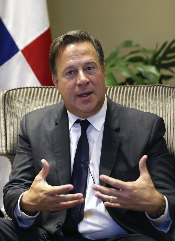 Panama&#039;s President Juan Carlos Varela speaks during an interview with The Associated Press at the Westin Hotel in Lima, Peru, Friday, April 13, 2018. Varela is in Lima to attend the Summit of the ...