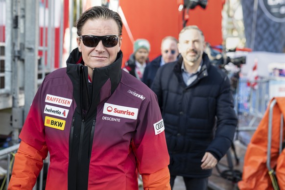 Urs Lehmann, President of Swiss-Ski, left, and Frederic Favre, State Councillor of the Canton of Valais leave an urgent meeting to discuss the differeces between FIS, Swiss-Ski and the Organising Comi ...