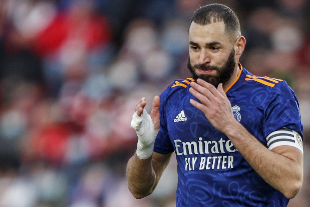 Real Madrid's Karim Benzema reacts after failing a chance to score during a Spanish La Liga soccer match between Granada and Real Madrid at Los Carmenes stadium in Granada, Spain, Sunday, Nov. 21 ...