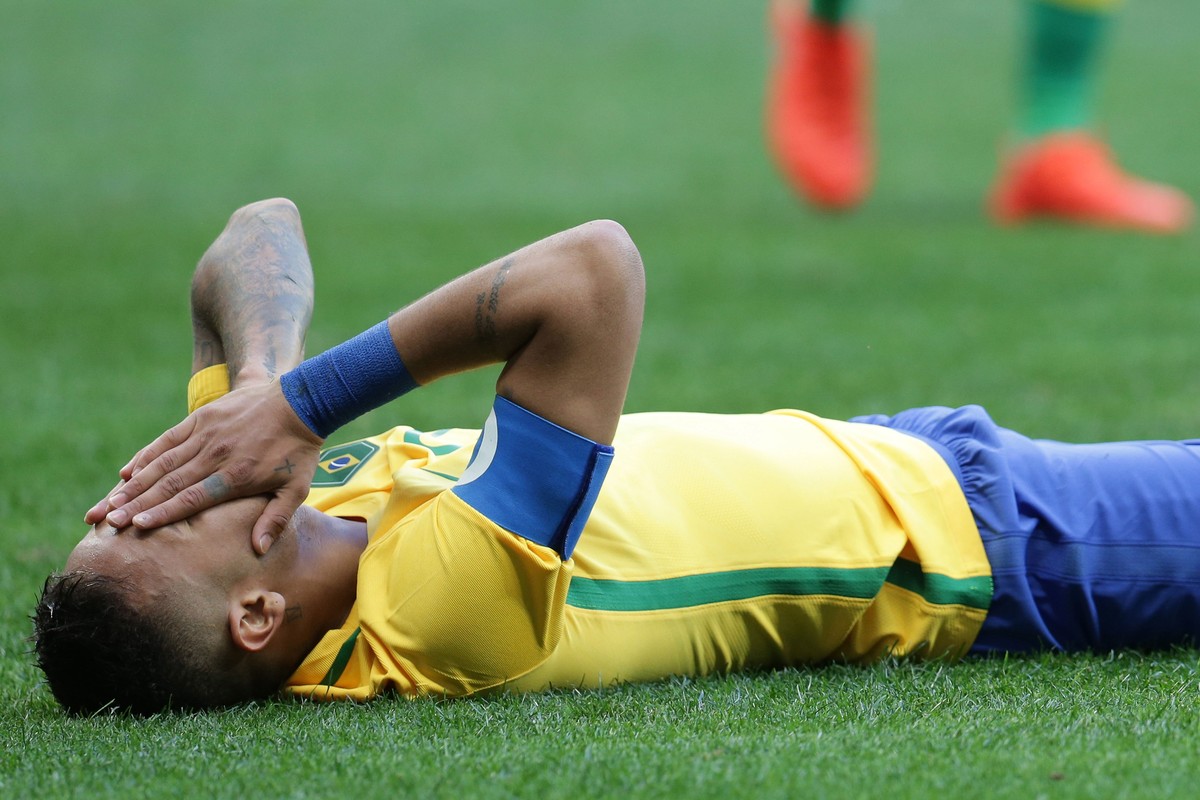 Brazil's Neymar reacts after missing a chance to score during a group A match of the men's Olympic football tournament between Brazil and South Africa at the National stadium, in Brasilia, B ...
