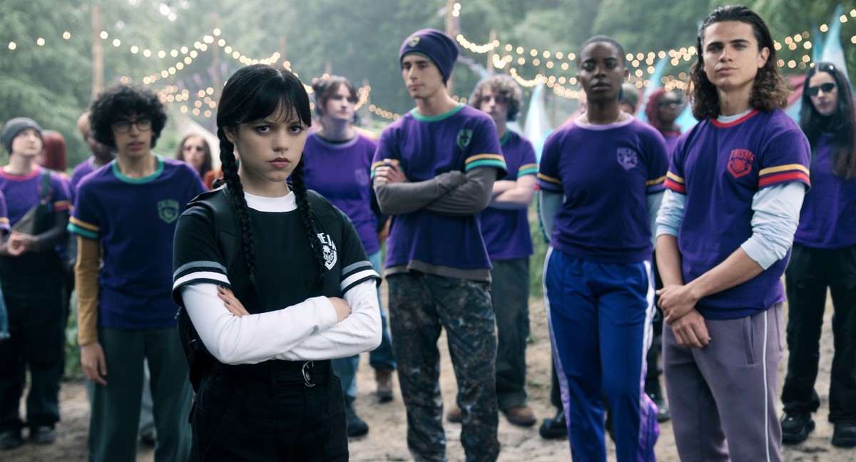 Wednesday. (L to R) Moosa Mostafa as Eugene, Jenna Ortega as Wednesday Addams, Georgie Farmer as Ajax, Joy Sunday as Bianca Barclay, Oliver Watson as Kent in episode 203 of Wednesday. Cr. Courtesy of  ...