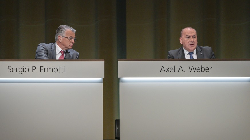 Sergio P. Ermotti, Group Chief Executive Officer of Swiss Bank UBS, left, and Axel A. Weber, Chairman of the Board of Directors of Swiss Bank UBS, right, pictured during the general assembly of the UB ...