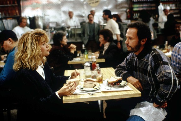 This image released by the Library of Congress shows Meg Ryan, left, and Billy Crystal in a scene from &quot;When Harry Met Sally.&quot; (MGM/Library of Congress via AP)