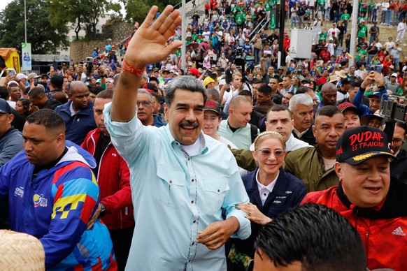 President Nicolas Maduro joins a rally a rally marking the anniversary of the Battle of Santa Isabel, which took place during Venezuela's 19th-century Federal War, in Caracas, Venezuela, Wednesda ...