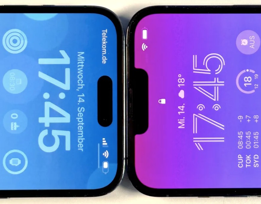iPhone 14 Pro Max (links) und iPhone 13 Pro Max. Statt der &quot;Notch&quot;, der Aussparung im Bildschirm rechts, gibt es nun einen pillenförmigen Ausschnitt im Display. (Quelle: t-online / Jan Mölle ...