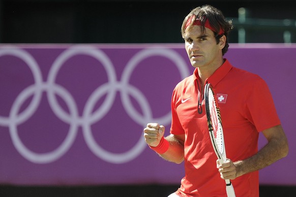 Switzerland&#039;s Roger Federer reacts during the men&#039;s semifinal singles match against Argentina&#039;s Juan Martin Del Potro at Wimbledon in London, Great Britain, at the London 2012 Olympic S ...